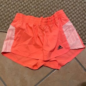 Orange Adidas shorts